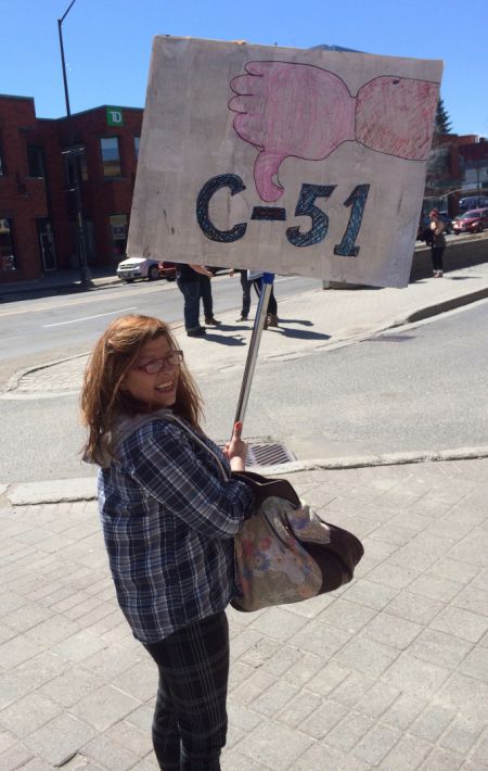 Rally participant Pierrette Gagnon showing her opposition to Bill C-51. (Photo by Scott Neigh)