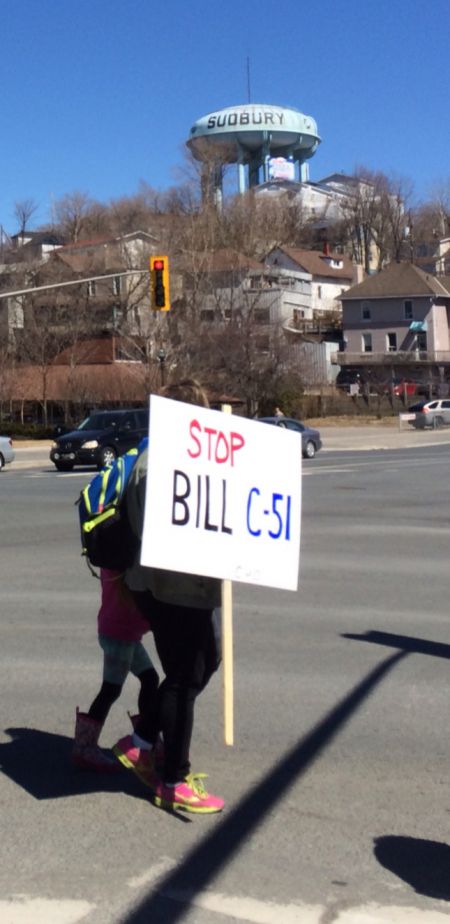 A demonstrator on today's march against Bill C-51 in downtown Sudbury, Ontario. (Photo by Scott Neigh)