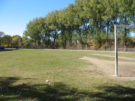 The schoolyard of the old Wembley P.S. is a priority site as it would fill gaps for neighbourhood and community parks, and is also next to Junction Creek (photo by Naomi Grant)