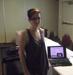 Laurel O'Gorman preparing to present a talk on the history of Pride as part of the 2013 Fierte Sudbury Pride week.