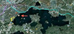 This map of Ramsey Lake shows the rail line in blue. The main water intake pipe for 60,000 Sudburians is indicated with the red arrow. (Map provided by Gordon Drysdale.) 
