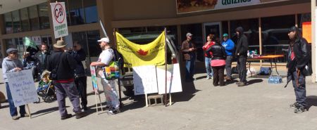 People beginning to gather in front of downtown Sudbury's Rainbow Centre for the rally against Bill C-51. (Photo by Scott Neigh)