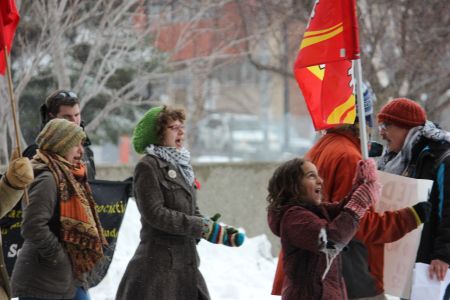 Demonstrators at last Friday's Solidarity Against Austerity action in Sudbury. (Photo by Larson Heinonen)
