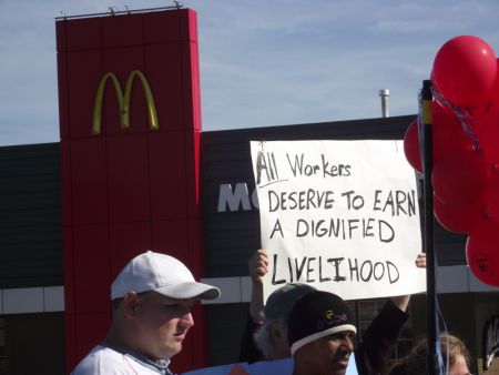 Demonstrators outside McDonald's on Notre Dame Avenue in Sudbury, Ontario, calling for an increase in the minimum wage to $14 an hour.