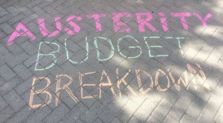 Some of the sidewalk chalking at the Austerity Budget Breakdown Funfest in front of the Provincial Building in downtown Sudbury.