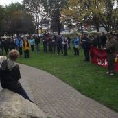 Close to 100 people gathered on Friday afternoon in Memorial Park in downtown Sudbury to demand improvements to social assistance and to voice opposition to cuts to a benefit that helps keep people out of homelessness. (Photo by Scott Neigh)