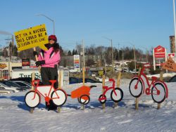‘Red bicycles popped up at busy intersections during morning rush hour all last week’ Photo Credit:  Glenn Murray